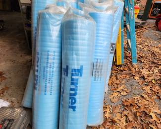 Rolls of foam laminate floor underlayment