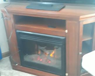Fire place and heater with remote control.  Nice condition,  in good working  order