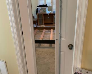 Over-the-door jewelry cabinet with mirror