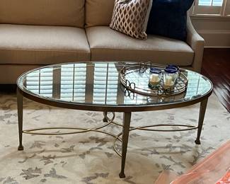 Glass-topped coffee table (couch and rug not for sale)
