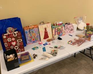 A small portion of the art/craft/sewing supplies; gift bags
