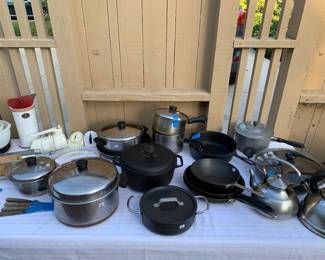 Lots of pots & pans, including vintage cast iron.