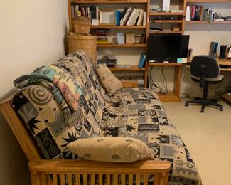 Many office supplies and a nice Epson printer. Futon is in excellent shape.