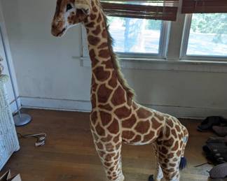a very tall (as giraffes end to be) plushie.