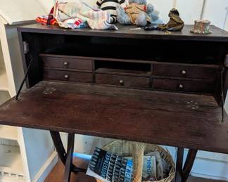 This writer's desk is taller than usual, it is super cool and you will love it-perfect for writing tall tales!