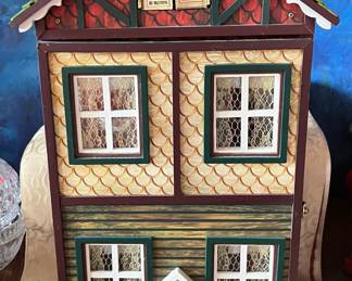 Holiday House 16.25 Inches Tall Lights up and Plays Music San Francisco Music Box Company $48.00