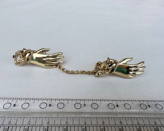 Hand Sweater Clip $6.00