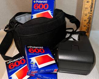 Polaroid with Film and Bag $25.00