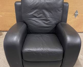One of two leather armchairs 
