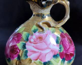 Hand Painted Ceramic Musical Teapot, 6", Nippon Hand Painted Floral Pitcher, 8", Urn Style Vase, 8", Royal Stuart Hand Painted Bone China Floral Teacup And Saucer, RS Prussie Hand Painted Lidded Teapot, 9", Cut Glass Flower Vase, 14", And More