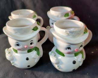 Christmas Assortment Including Lefton Snowman Mugs, Qty 4, Department 56 Snowbabies Figurine, Holiday Living Reindeer Figurines, Qty 2, New In Box, And Santa Figurine