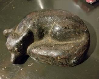 Cast iron sleeping dog figurine
