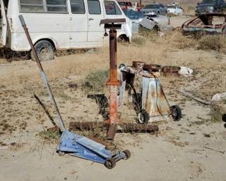 #2116 • Floor Jack, Transmission Jack, and Portable Grinding Station
