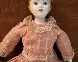 Vintage porcelain doll with 1920s hair style