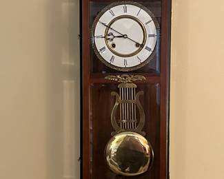 Pendulum wall clock with chimes