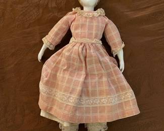 Vintage porcelain doll with 1920s hair style