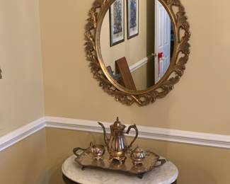 Marble table and Oneida silver service