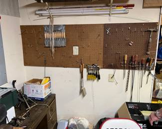 Tools, peg board and hooks, light bulbs.