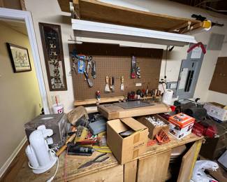 Tools, paintbrushes, shop items.