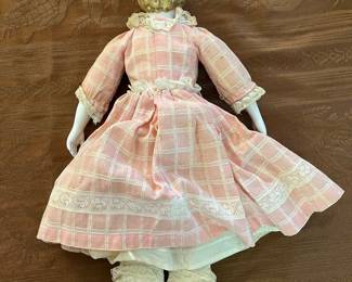 Vintage porcelain doll with 1920s hair style