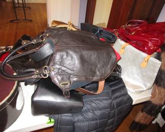 Large amount of designer handbags