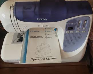 BROTHER SEW MACHINE AND CABINET 