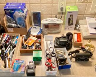 Office Supplies • Cordless Phone • Digital Clock • Tracfones