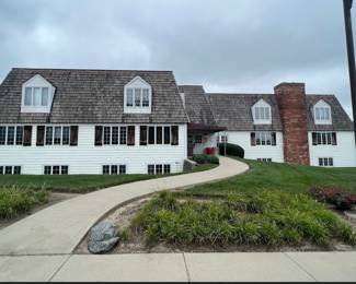 Main entrance.  Door will be open; follow signs to 2nd floor.  No elevator.  You can park in the parking lot.