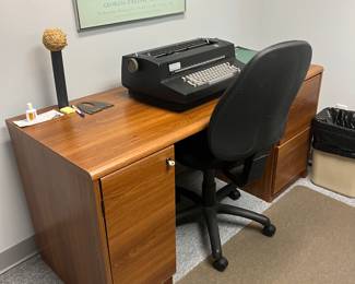 desk with filing cabinets