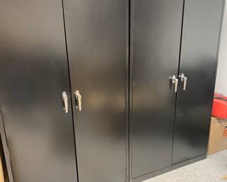 Black metal storage cabinet; one available