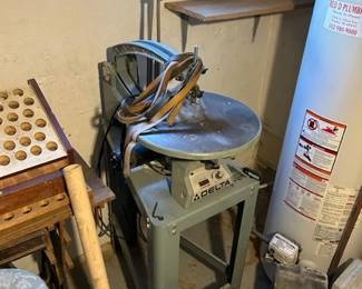Delta scroll saw on stand with light. Like new. 
