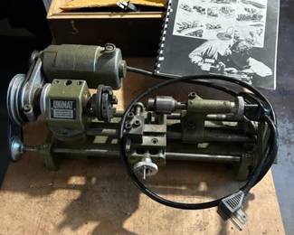 Vintage UniMatt metal lathe. With box and attachments.  Excellent condition. 