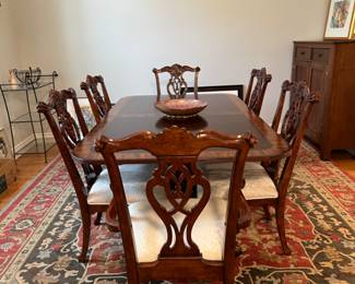 Magnificent Mahogany Dining Table with Two Captain Chairs, Four Side Chairs and Two Leaves. 74" L x 44" W, Leaves are 18"