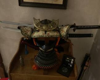 samurai  helmet and swords dates unknown but thought to be Edo period