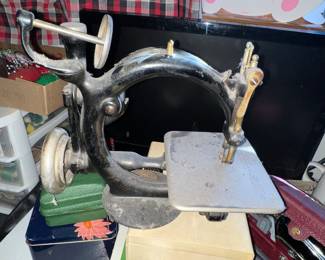 Antique Wilcox + Gibbs Cast iron miniature sewing machine