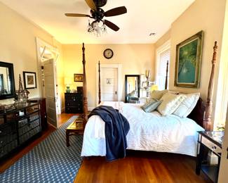 4 post bed with like new bedding, stark carpet runner, mirrored dressers, original oil paintings etc.