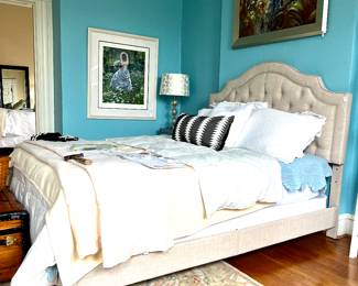 Queen upholstered bed with like new bedding