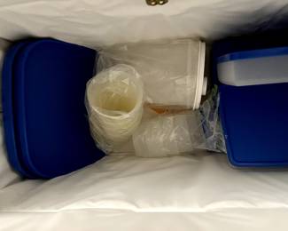 Vintage tupperware in blue bag.