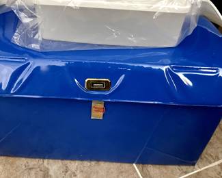 Vintage tupperware case we found in a box, complete with tupperware inside. Etsy has this set for $225.00