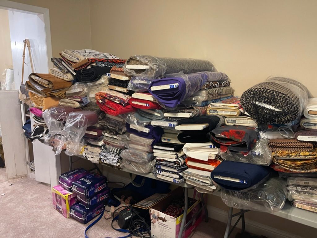 The room is dedicated to fabrics on Bolts and Rolls, but there is a separate house that has more fabric and there's fabric in other rooms...