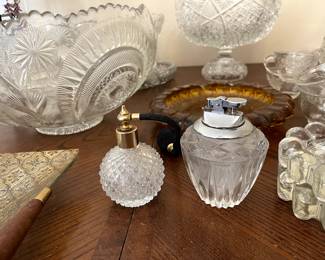 crystal perfume bottle and cigarette lighter.