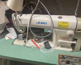 Vintage Jukie sewing machine with table.
