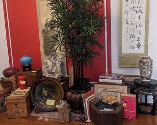 Scrolls, ceramics, driftwood, shells, and hibachis. 