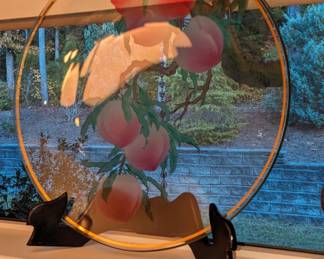 Two large glass decorative plates purchased at the Chinese expo during the New York world's fair