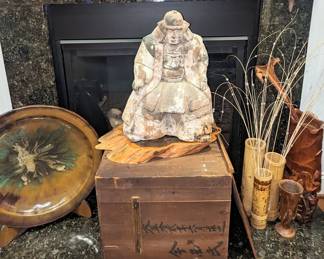 Antique, carving.  Masmune 1567 -1636 was born in  Yonezawa Castle in what's now  Yamagata Prefecture. Having lost sight in his right eye as a child. Masamune was known as the one-eyed dragon or  dokuganryu. He was identified with a huge crescent moon on his helm. 