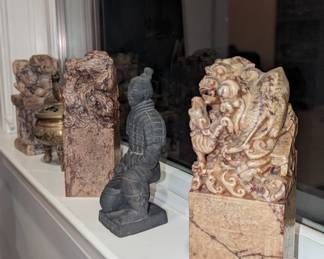 One pair of dragon topped carved chops and one food dog chop. A kneeling samurai. A food dog incense burner bronze