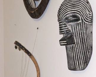  Nyamwezi three strained carved bow, KWELE  Ekuk mask face carved in heart,  Basonge mask the black and white striking stripes.