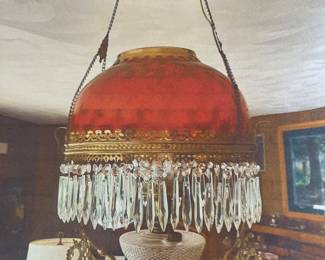 Vintage ruby red parlor lamp. This is a picture of when it was hung. 