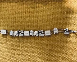 Vintage Gold Tone Postal Sliding Charm Bracelet.