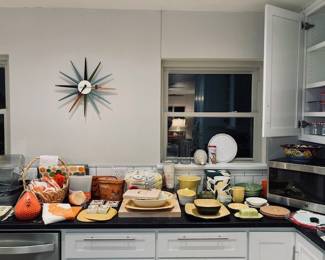 Large Selection of Kitchen Items, Food Storage, GE Countertop Microwave Oven, Vitra Sunburst Wall Clock.